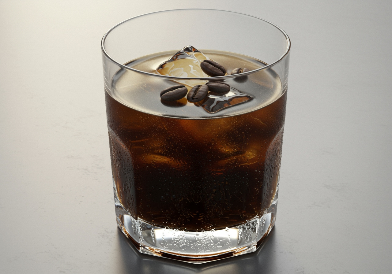 A Black Russian cocktail in a rocks glass with a few coffee beans as garnish.